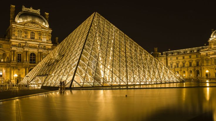 Louvre Glass Pyramid lit up at night